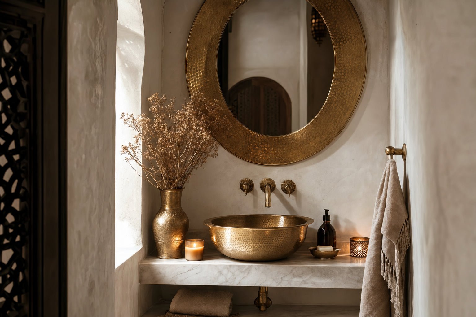 Moroccan-inspired bathroom with handcrafted brass fixtures
